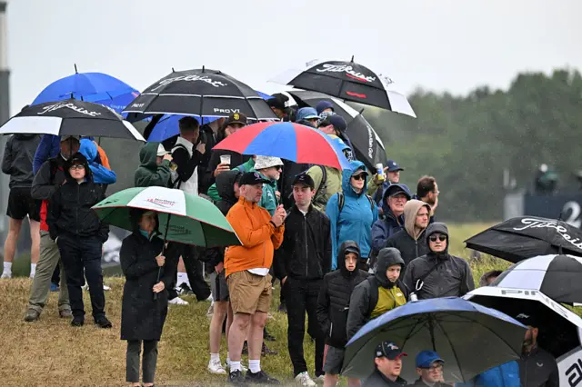 Spectators in the rain at the Royal Portrush for The Open