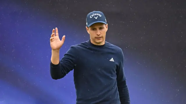 Matthew Jordan waves to the crowd during the 153rd Open Championship