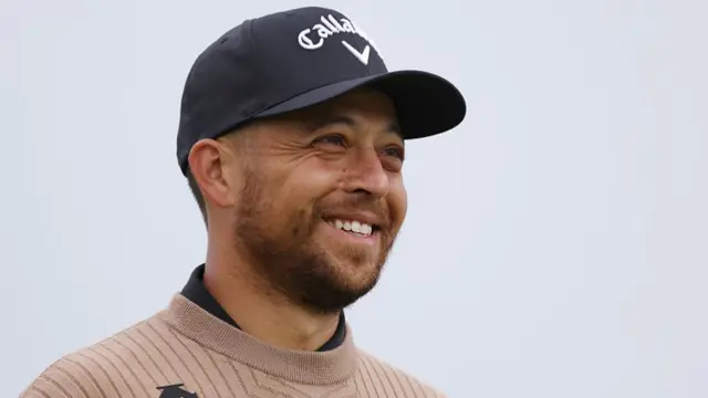 Xander Schauffele smiles during the Open Championship at Royal Portrush