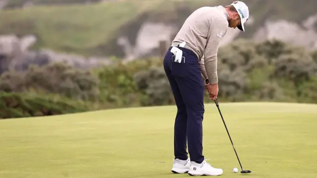 Sam Burns putts at The Open Championship
