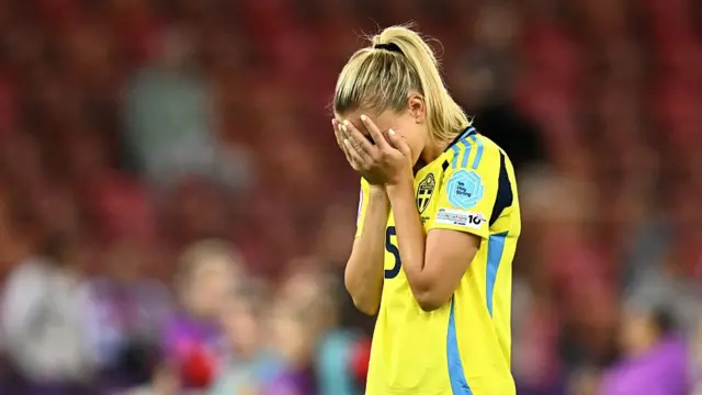 Sweden's defender #05 Amanda Nilden reacts