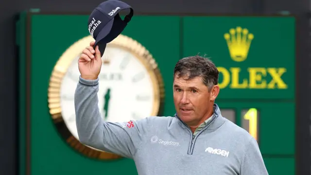 Padraig Harrington raises his hat