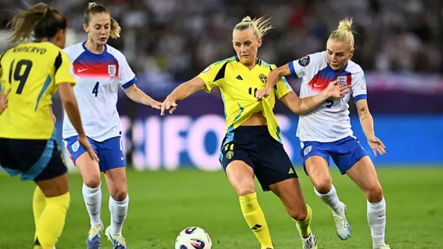 England's midfielder #04 Keira Walsh fights for the ball with Sweden's forward #11 Stina Blackstenius and England's defender #05 Alex Greenwood