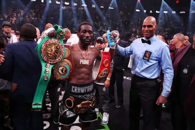 Terence Crawford with world titles