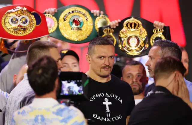 Oleksandr Usyk looking on