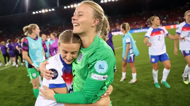 Hannah Hampton of England celebrates with team mate Chloe Kelly after the team's victory in the penalty shoot out and subsequent progression to the semi-final during the UEFA Women's EURO 2025 Quarter-Final match between Sweden and England at Stadion Letzigrund