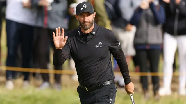 Dustin Johnson acknowledges the crowd during the 153rd Open Championship at Royal Portrush
