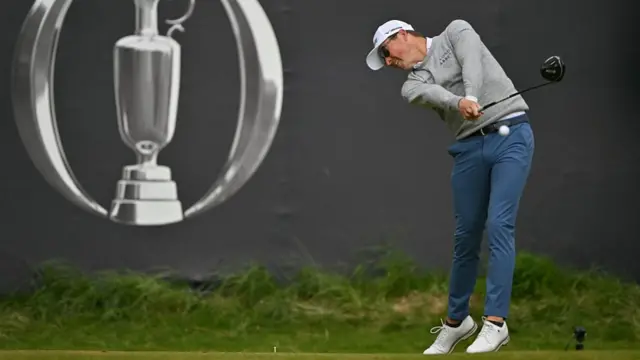 Mid shot of Ben Griffin driving off the 1st tee at Royal Portrush in the 153rd Open Championship
