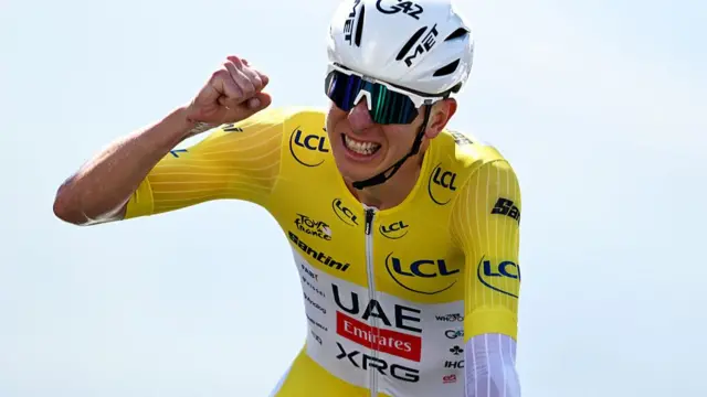 Tadej Pogacar celebrates winning stage 13 of the 2025 Tour de France