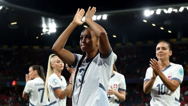 Switzerland players applauding their fans