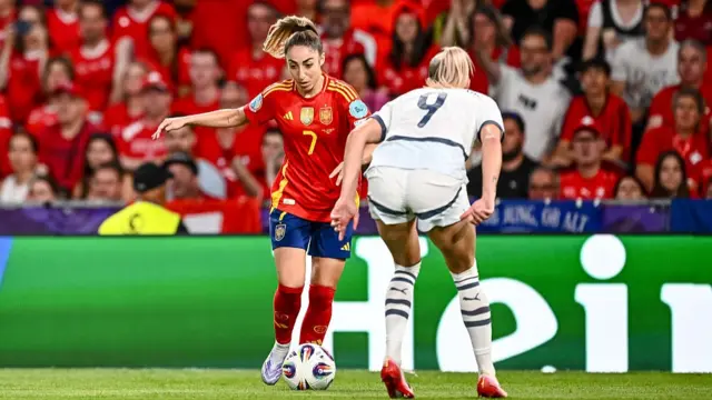 Olga of Spain and Noemi Ivelj of Switzerland battle for the ball