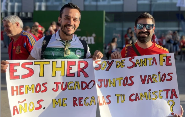 Spain fans with a sign