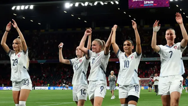 Switzerland players applauding their fans