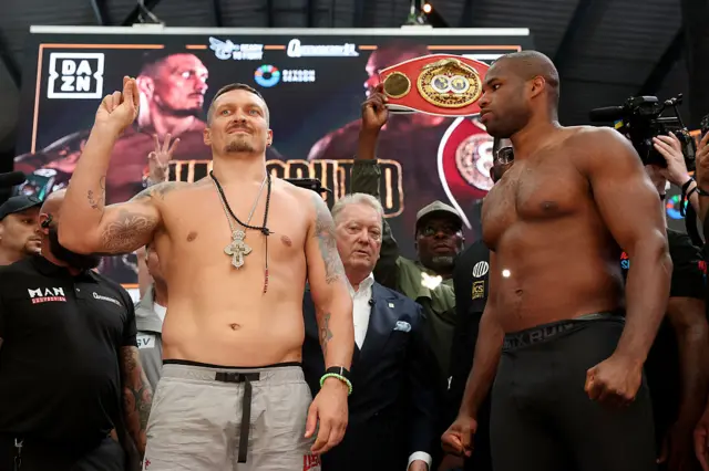 Oleksandr Usyk and Daniel Dubois standing side-by-side