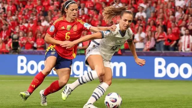 Lia Waelti of Switzerland is challenged by Aitana Bonmati of Spain