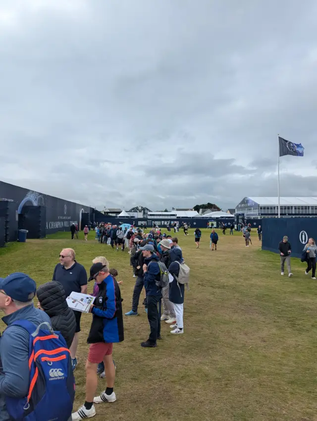 Fans queue for first tee