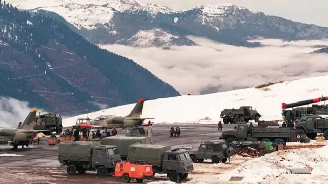 Peyragudes airfield with military vehicles