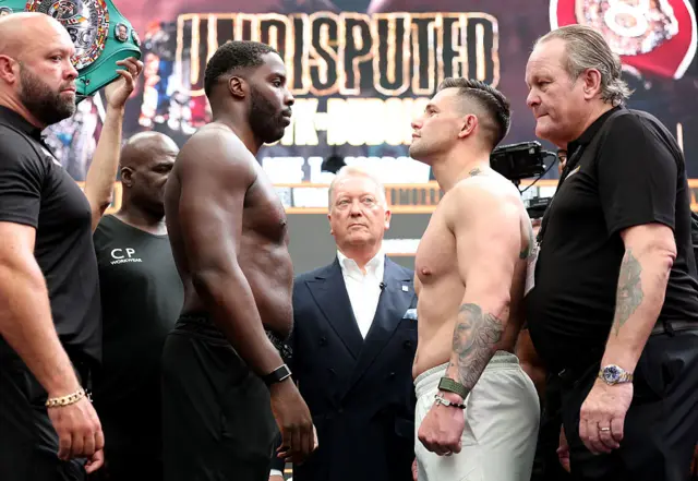Lawrence Okolie facing off with Kevin Lerena
