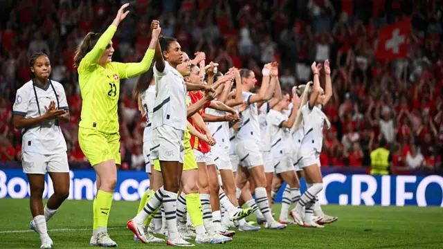 Switzerland's team greets fans after loosing