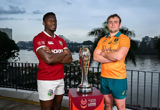 Captains pose with the trophy