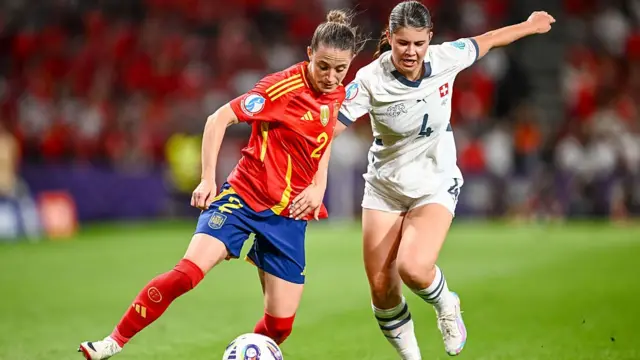 Ona Batlle of Spain and Noemi Ivelj of Switzerland battle for the ball