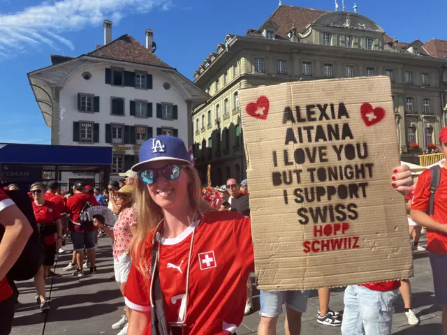 Switzerland fan with sign