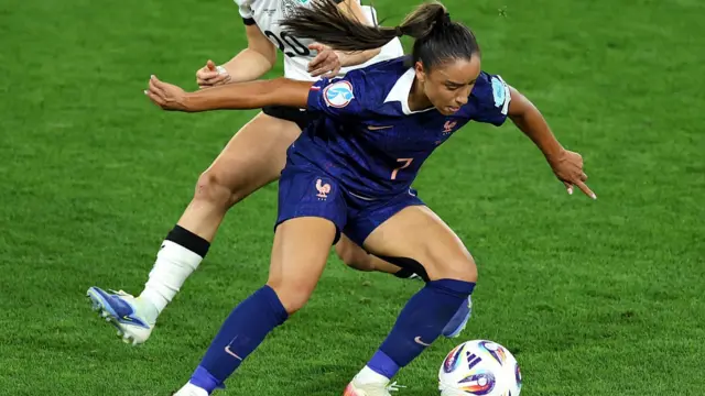 Sakina Karchaoui of France is challenged by Elisa Senss of Germany