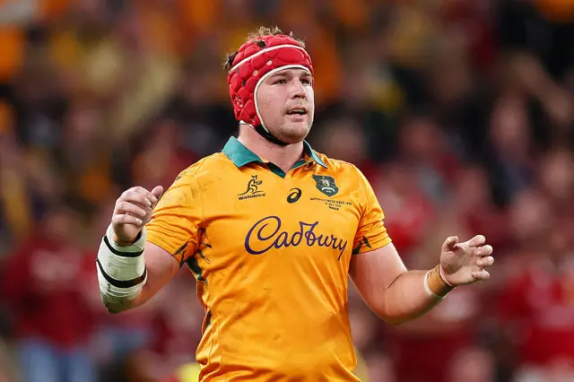 Harry Wilson of the Wallabies looks on
