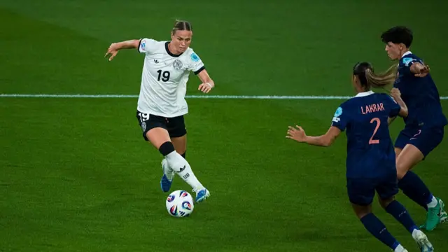 Klara Buhl of Germany (L) plays against Maelle Lakrar of France (R)