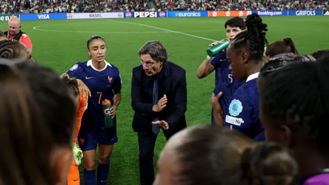 Laurent Bonadei, Head Coach of France, gives a team talk prior to extra time