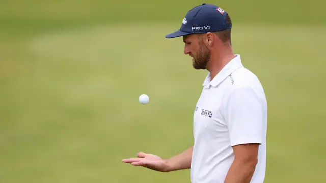 Wyndham Clark looks at his ball during the 2025 Open Championship