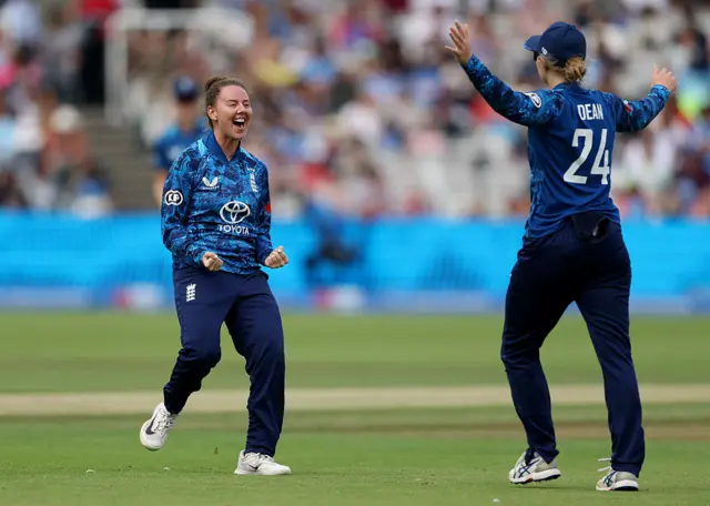 Linsey Smith of England celebrates taking the wicket of Smriti Mandhana