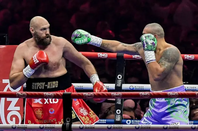 Tyson Fury in the ring with Oleksandr Usyk