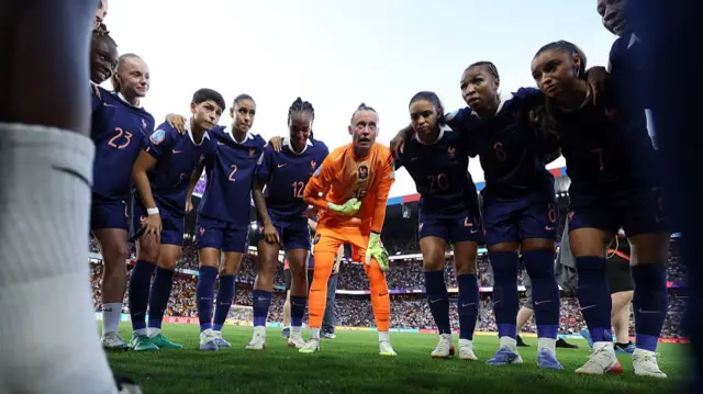 Pauline Peyraud-Magnin of France gives her side instructions during a team huddle
