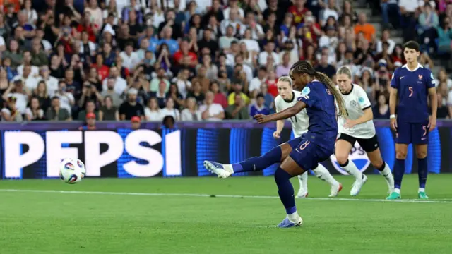 Grace Geyoro of France scores her team's first goal from the penalty spot