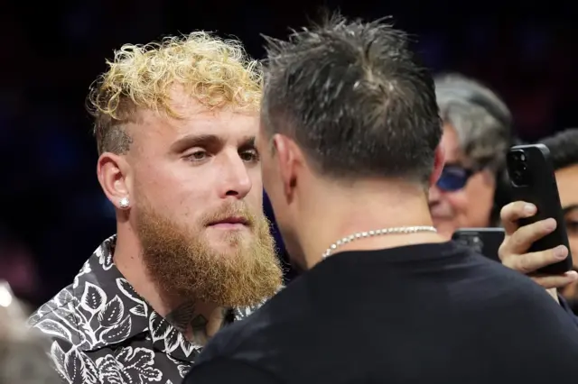 Jake Paul faces off with Oleksdandr Usyk