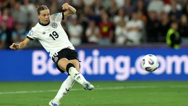 Klara Buehl of Germany scores the team's sixth penalty in the penalty shoot out