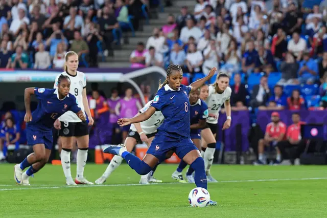 Onema Grace Geyoro of France scores the first team goal from the penalty spot