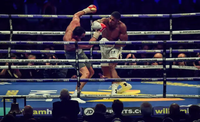 Joshua lands a punch on Klitschko