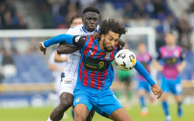 St Johnstone's Adama Sidbeh and Inverness' Remi Savage