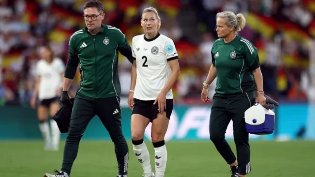 Sarai Linder of Germany receives medical treatment