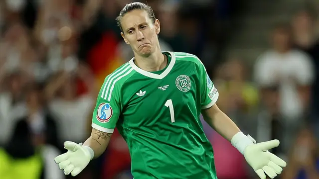 Ann-Katrin Berger of Germany celebrates scoring the team's sixth penalty in the penalty shoot