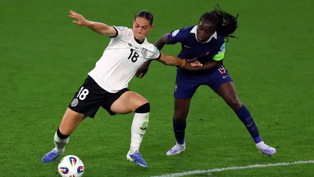 Giovanna Hoffmann of Germany is challenged by Griedge Mbock Bathy of France
