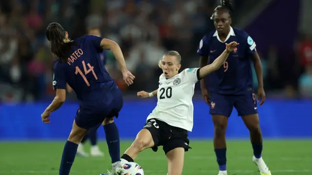 Elisa Senss of Germany is challenged by Clara Mateo of France