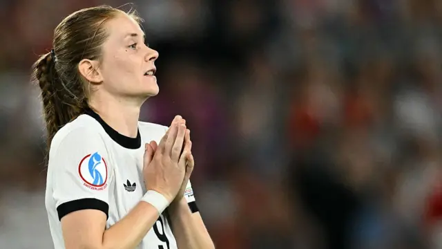 Germany's midfielder #09 Sjoeke Nuesken reacts