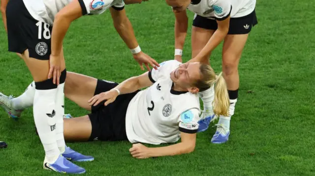 Germany's Sarai Linder reacts after sustaining an injury