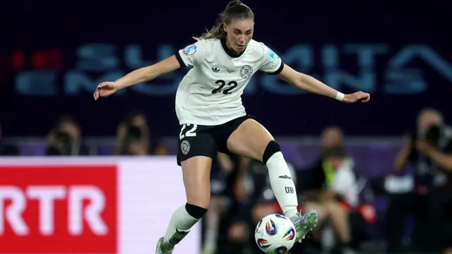 Jule Brand of Germany controls the ball