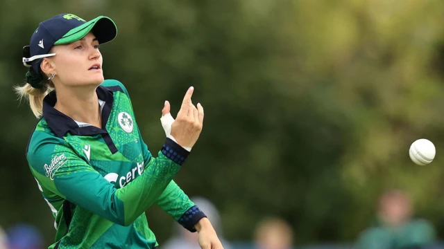 Ireland's Gaby Lewis throws a cricket ball