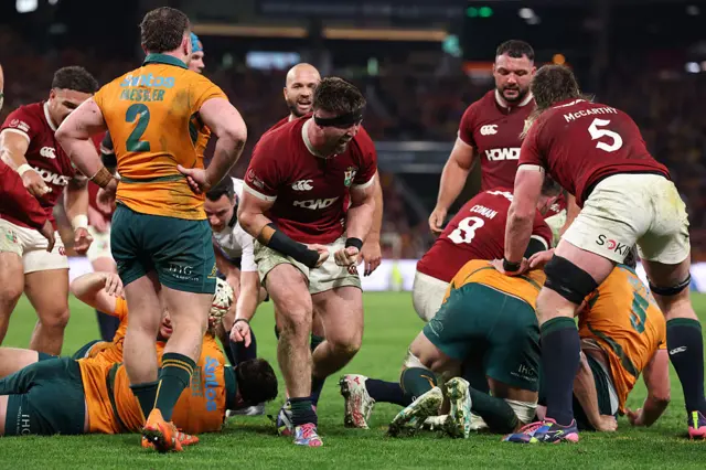 Tom Curry of British and Irish Lions celebrates after scoring