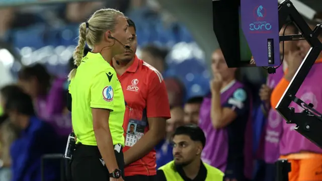 Referee Tess Olofsson reviews the VAR monitor which results in a goal scored by Grace Geyoro of France (not pictured) been ruled out for offside